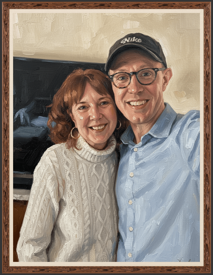 A happy man wearing glasses and a hat, with a woman, smiling for a photo indoors.